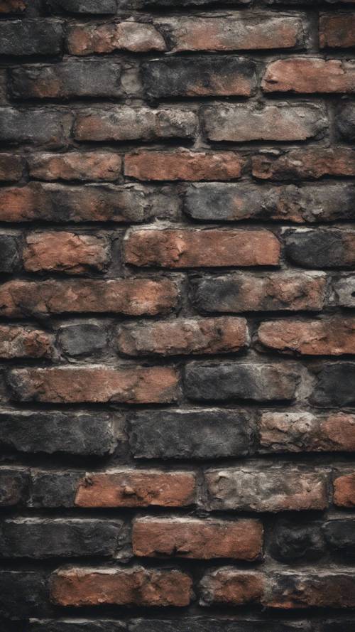Uma parede de tijolos pretos desbotada pelo tempo e desgastada pelo tempo.