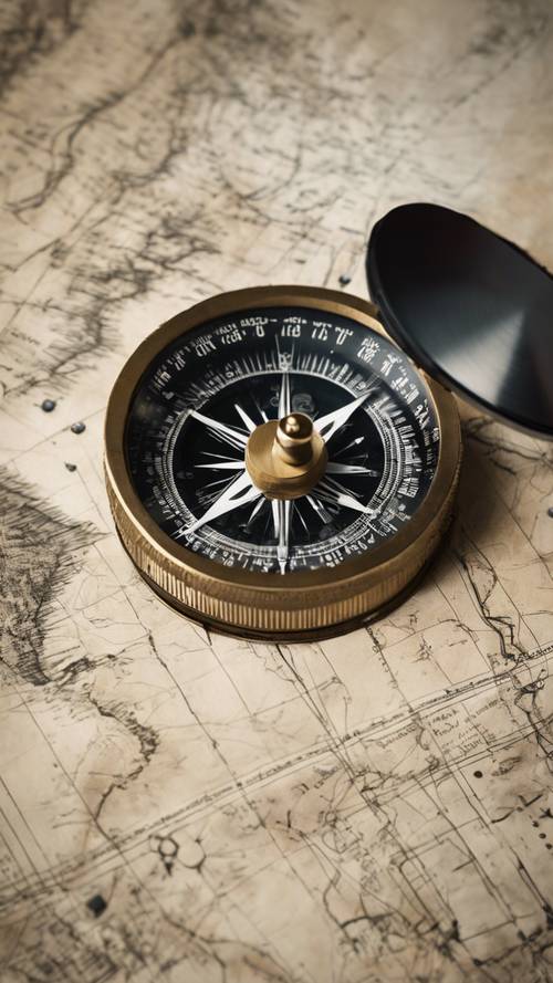 Kompas marynarski ustawiony obok przybliżonego szkicu niezbadanego terytorium na południowym Pacyfiku.