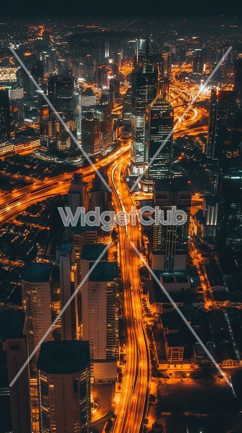 Luces de la ciudad y rascacielos por la noche