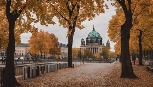 Pemandangan musim gugur Berlin, dengan Gendarmenmarkt dikelilingi pepohonan yang memamerkan dedaunan musim gugurnya.