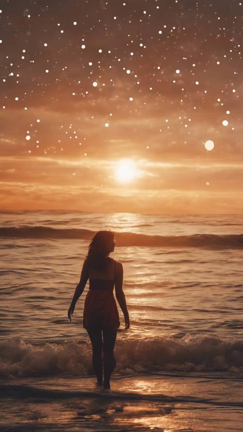 Pemandangan matahari terbenam di tepi pantai, dengan konstelasi Aquarius mulai terlihat di langit.