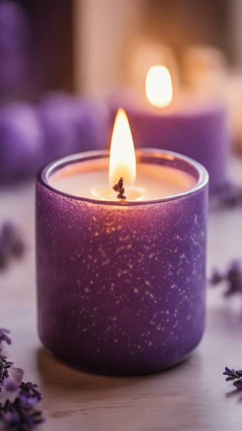 A lavender-scented candle casting a warm, inviting glow in a cozy room.