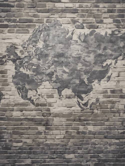 A world map in gray tones painted on a brick wall.