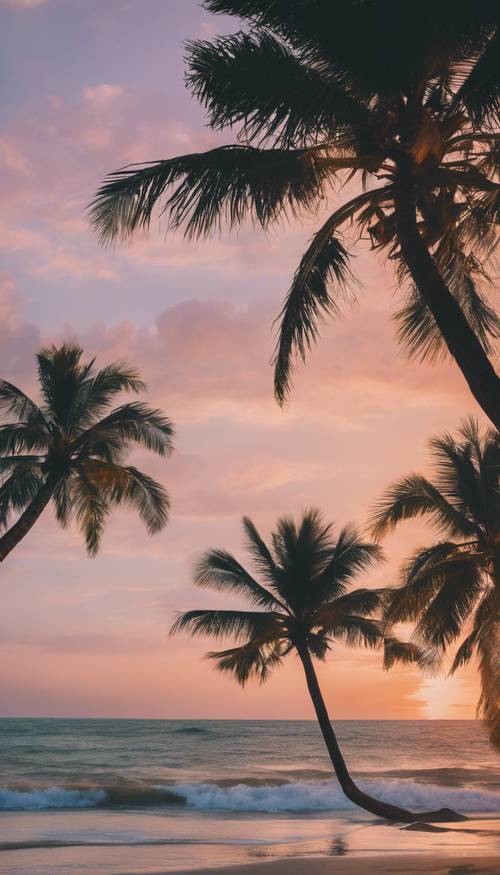 Величественный закат над безмятежным пляжем с покачивающимися на ветру пальмами.
