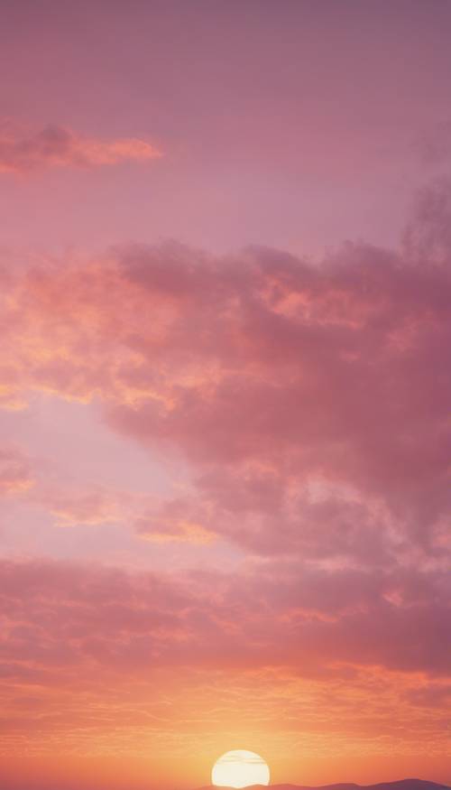 พระอาทิตย์ขึ้นที่ทาสีอย่างสวยงามด้วยเฉดสีชมพูอ่อนและสีส้ม ทำให้เกิดเอฟเฟกต์ออมเบร