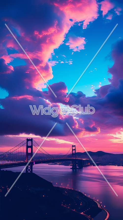 夕焼けに染まる景観の橋と鮮やかなピンク色の空