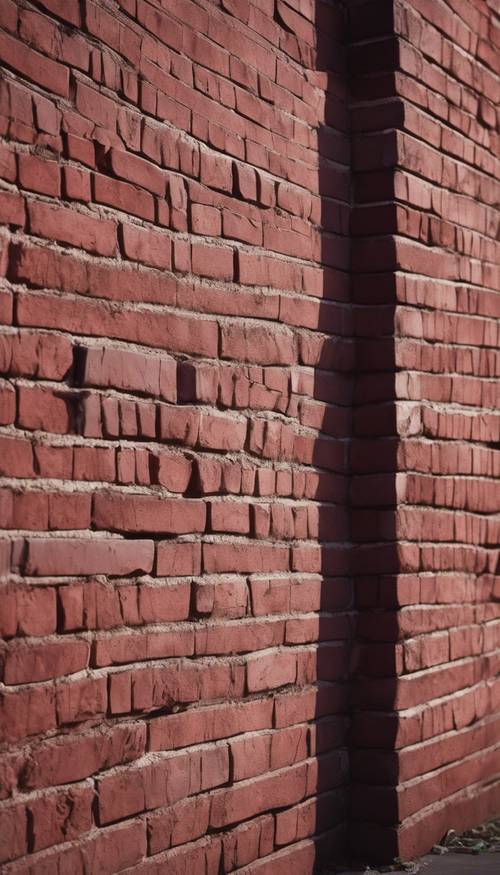 A burgundy brick wall under moonlight with shadows draped