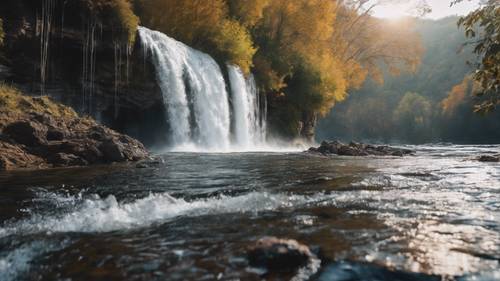 Una poderosa cascada cayendo por un acantilado, con &#39;Tengo el poder de la persistencia&#39; apareciendo en el agua que cae.