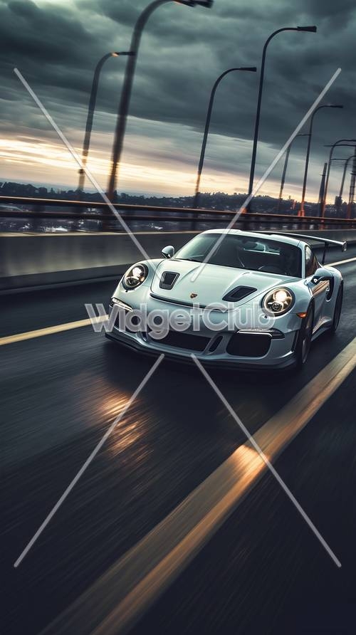 Speeding Silver Sports Car on Highway at Sunset Wallpaper[00c1ae0fd0354acd96b1]