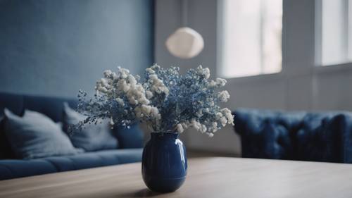 A navy blue floral-close up in a minimalist Scandinavian interior.