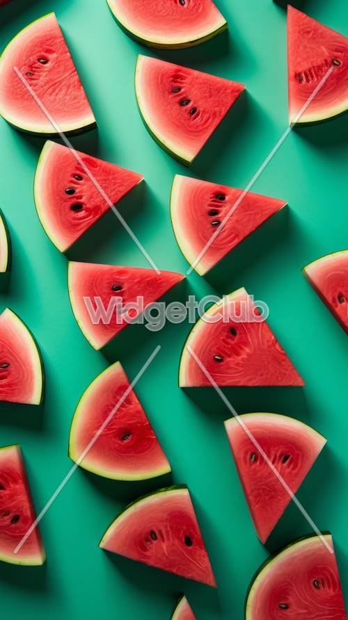 Bright and Juicy Watermelon Slices on Green Background