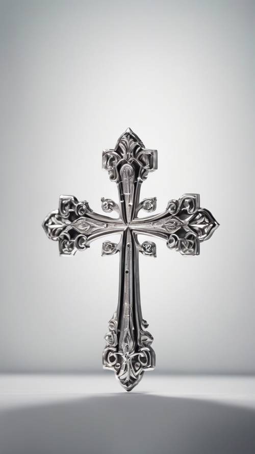 Croce cristiana dal design semplice ed elegante in argento su uno sfondo bianco pulito.