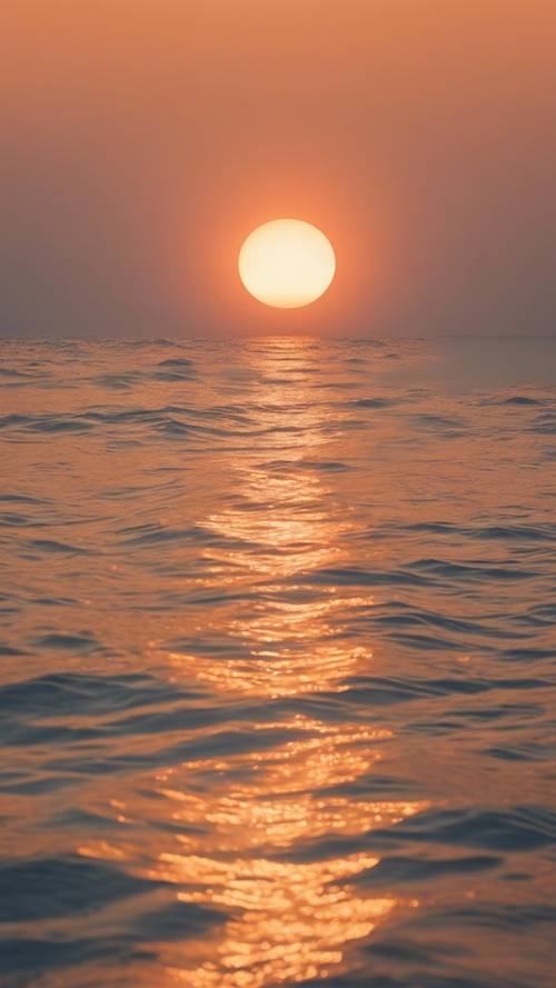 平静的海面上，洒满鲜艳的淡橙色落日。