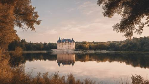 A magnificent French country château overlooking a serene lake, lit softly by the sunset.