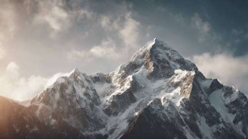 Una escarpada cadena montañosa, cuyo pico más alto lleva la inscripción &#39;Levanto mis ojos a las montañas&#39;.