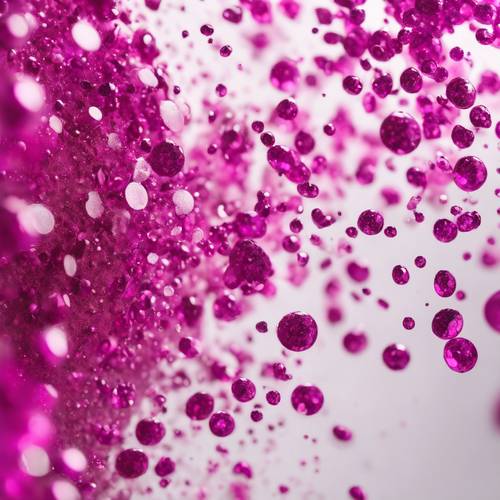 Magenta glitter falling gently onto a pure white surface.