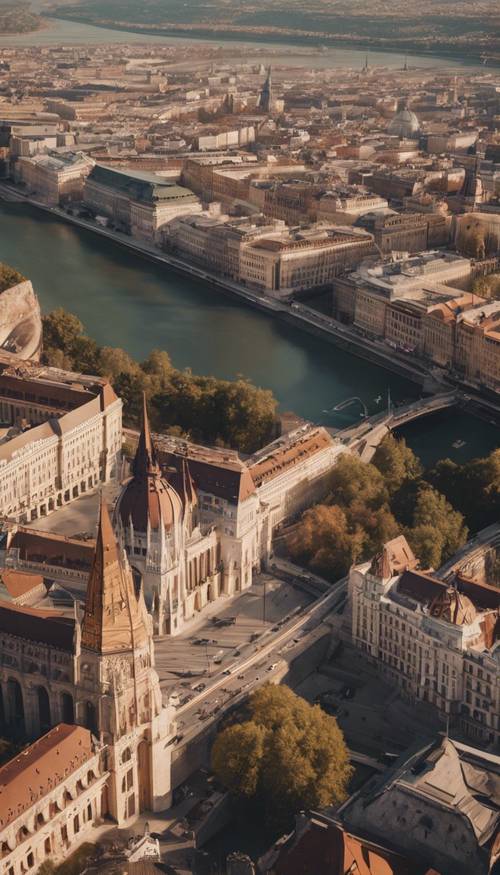 Uma foto aérea de Budapeste, destacando sua beleza arquitetônica sob o sol da tarde.