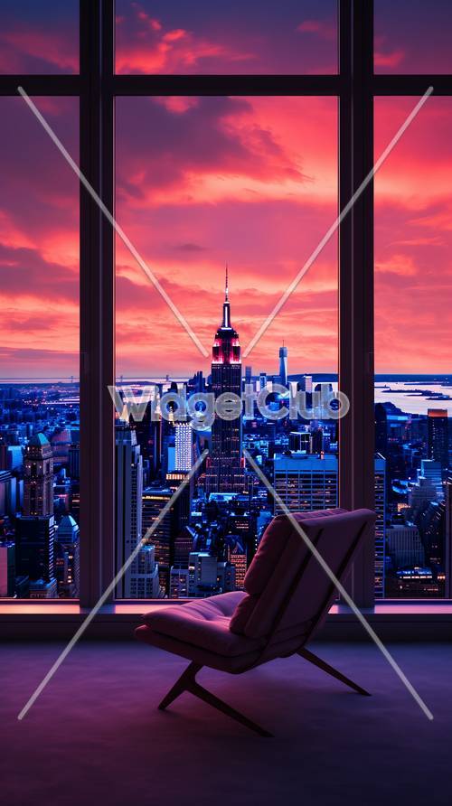 Splendido skyline della città al tramonto vista da una finestra