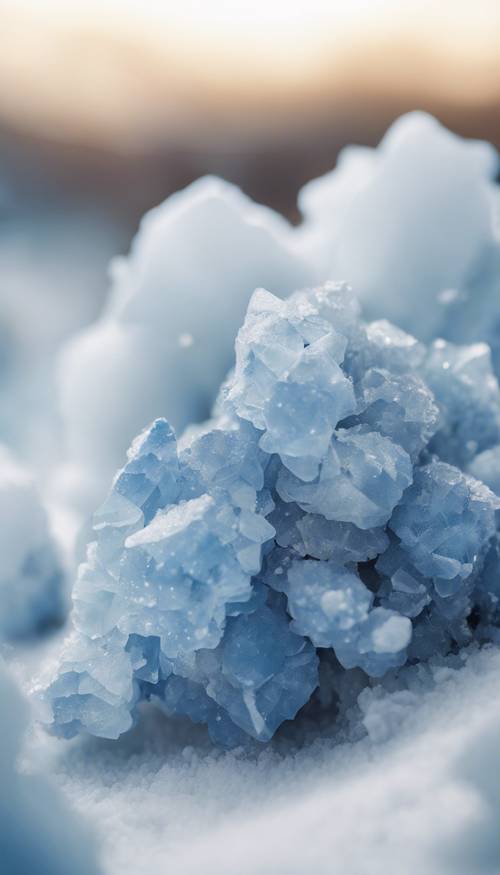 A cluster of celestial blue celestite crystals surrounded by pure white snow.