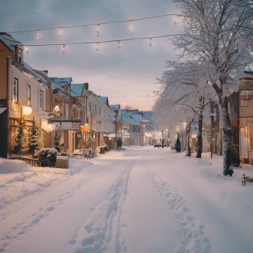 A quaint small town covered in fresh white snow during a peaceful evening.