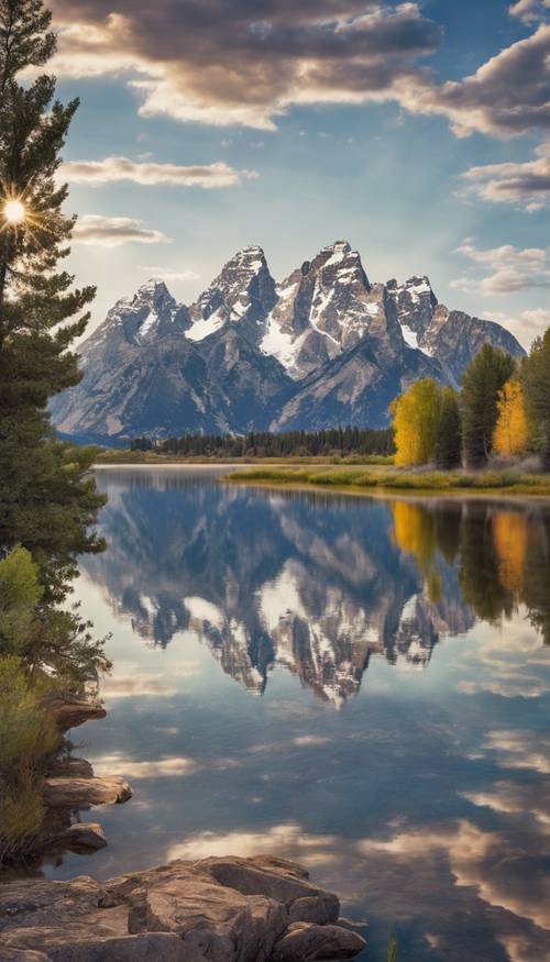 A regeneration of the Grand Tetons in Wyoming, with a crystal clear reflection on the lake below.