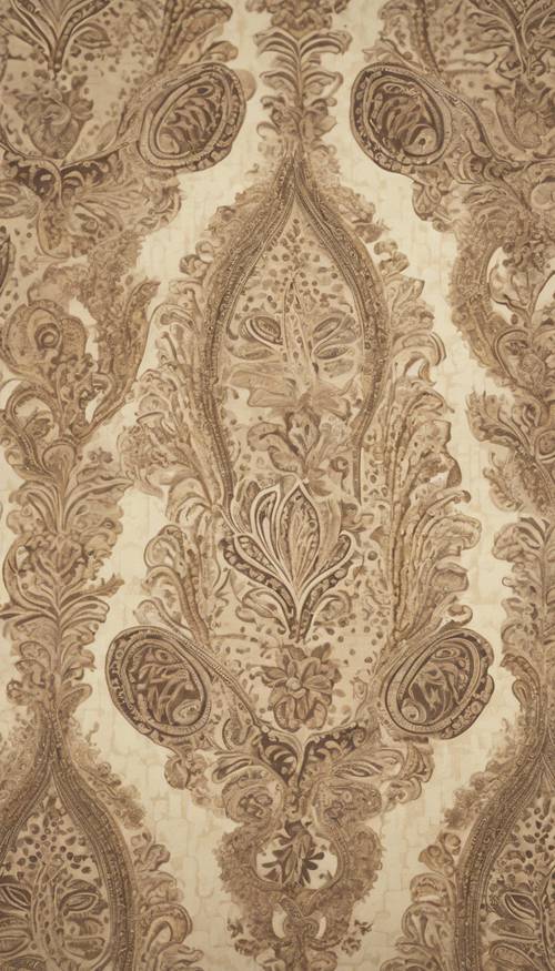 A portrayal of a beige paisley pattern on a vintage wallpaper.