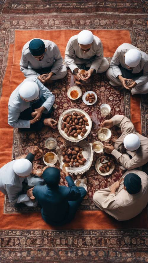 Grupa muzułmanów siedzących razem na perskim dywanie i przerywających post daktylami i wodą podczas świętego miesiąca Ramadan.