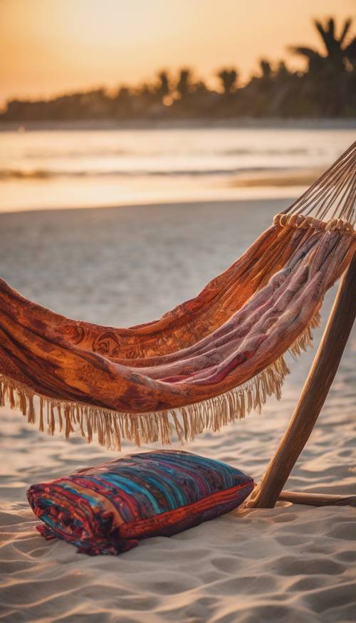 Sunset scene on a tropical island beach, a hammock strung between two palms, a pile of bohemian themed cushions and blankets spread out on the warm sand.