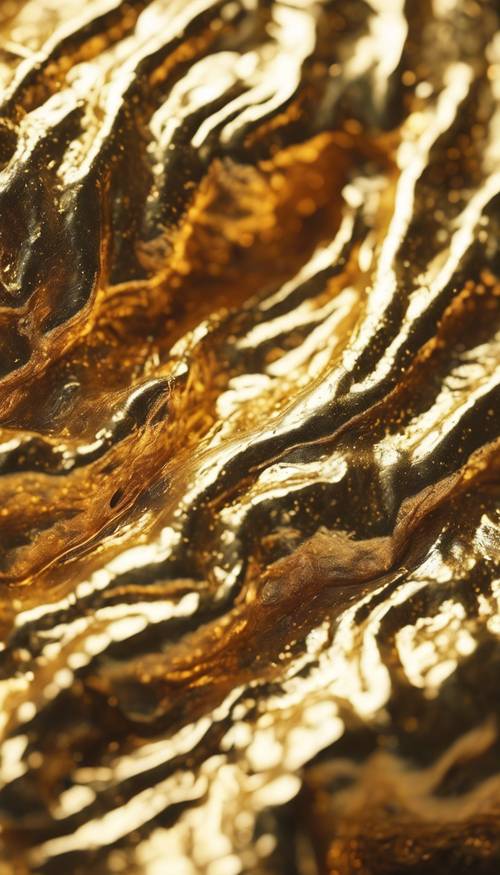 非客觀藝術中熔化的黃金的紋理表面。