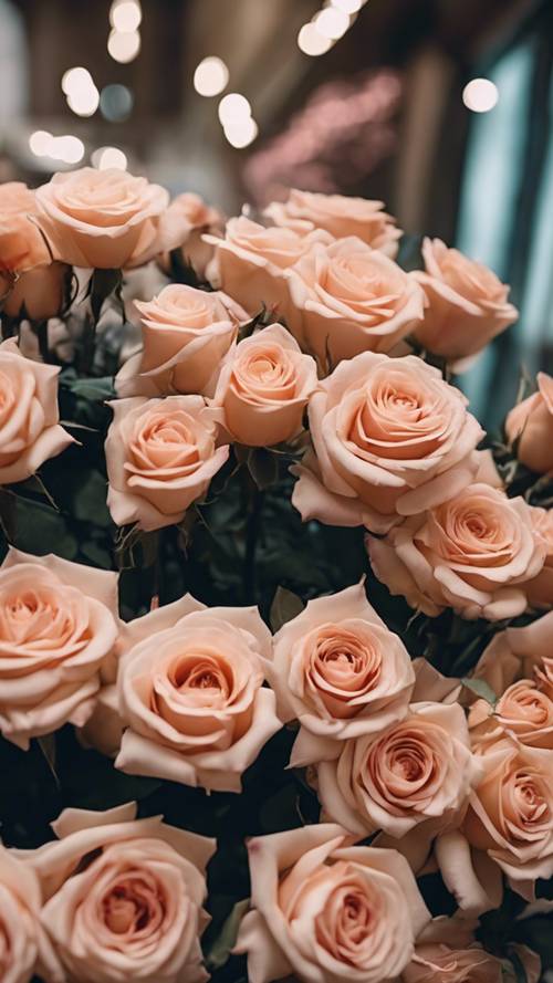 Những bó hoa hồng dễ thương được sắp xếp một cách thẩm mỹ trong một cửa hàng bán hoa.
