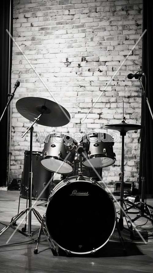 Drum Set in Front of a Brick Wall