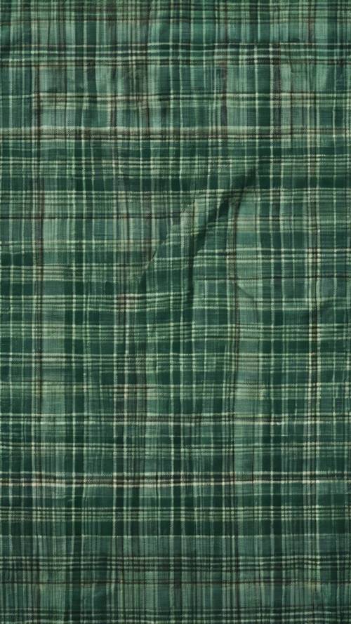 Uma imagem de alta qualidade mostrando uma foto macro detalhada da textura do tecido xadrez verde.