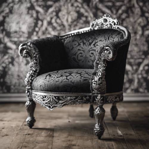 A black and silver damask upholstered antique chair.