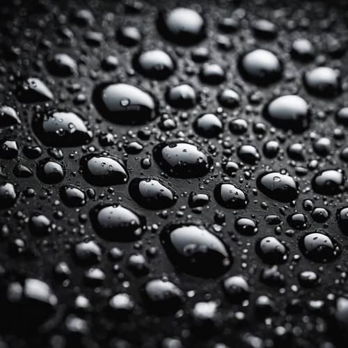 Detailed macro shot of water droplets on a black leather surface.
