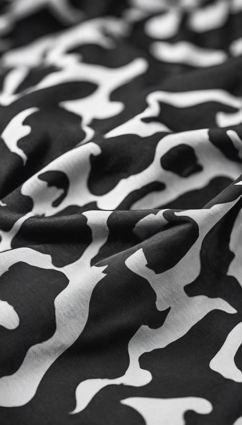 Close-up detail of a black and white camo T-shirt.