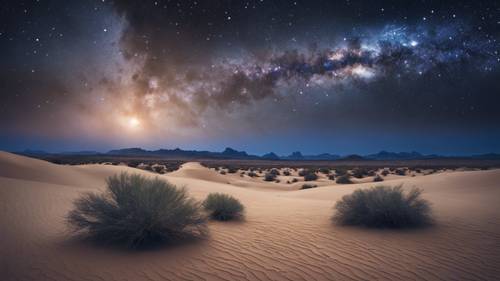 황량한 사막 풍경 위에 별이 빛나는 사파이어 밤하늘.