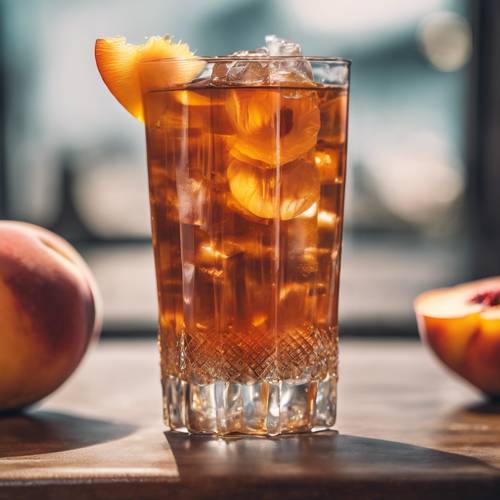 A crystal glass filled with peach flavoured iced tea and a slice of peach.