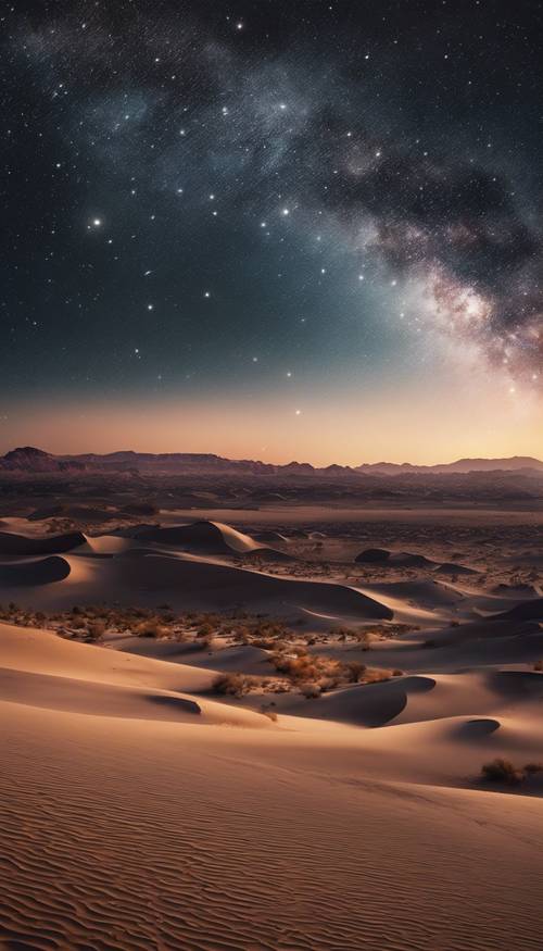 Binlerce parlayan yıldızla dolu, genişleyen bir çöl manzarasını aydınlatan gece gökyüzü.