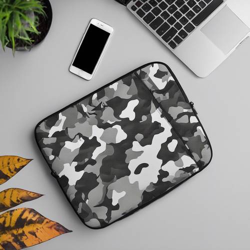 Laptop sleeve with a modern black and white camo print.