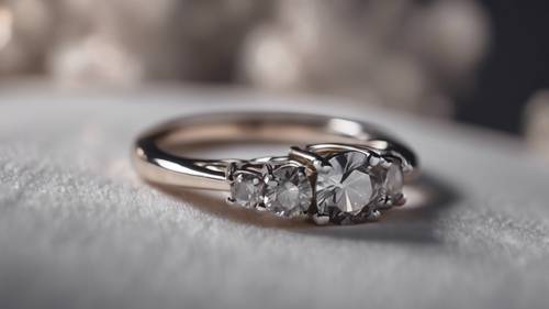 A multi-stone gray diamond ring on a bride's hand.