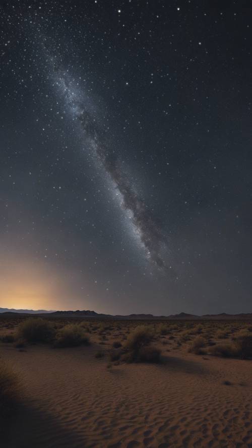 Una pioggia di meteoriti visibile dal remoto deserto sotto un cielo scuro e limpido.
