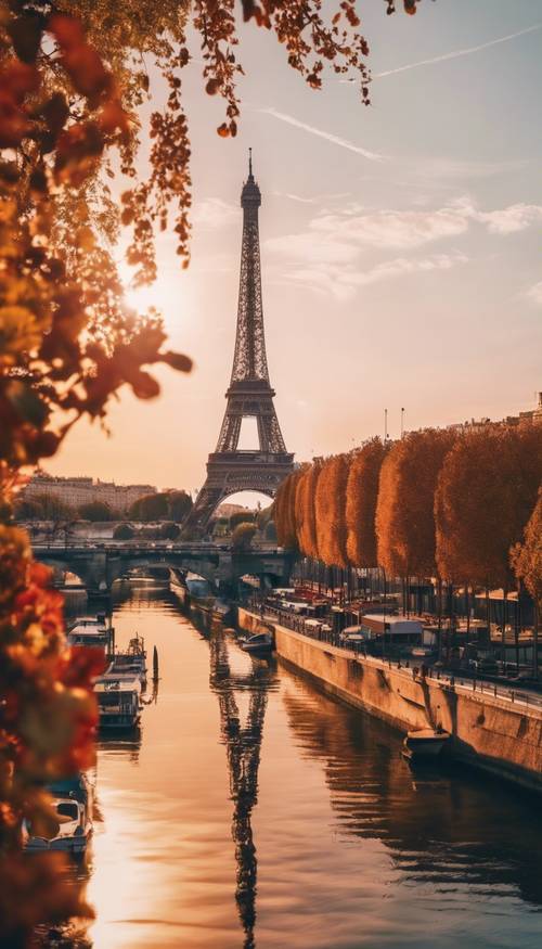 Kolorowy zachód słońca nad słynną Wieżą Eiffla w Paryżu.