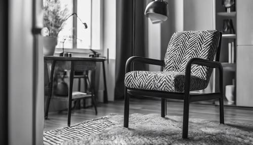 Ein schwarz-weißer Stuhl mit Fischgrätenmuster in einem minimalistischen Wohnzimmer.