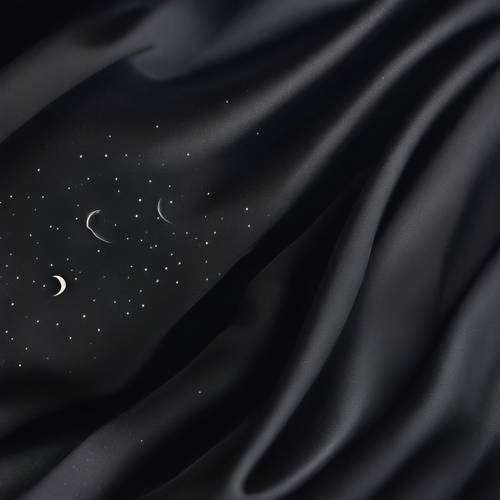 A smoothly waving pattern of a black silk fabric under a soft moonlight, with a small crescent moon reflected on its surface.