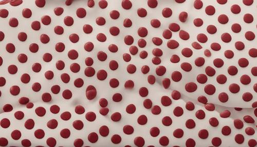 一种以红白圆点为灵感、设计有复杂图案的装订布。