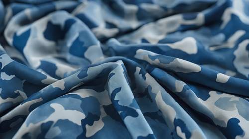 Zbliżenie obrazu tekstury tkaniny w niebieskim kamuflażu.