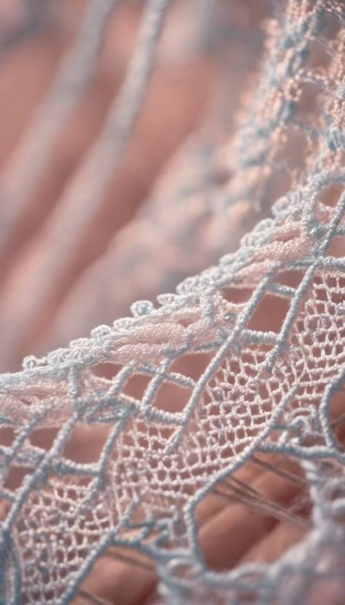 A close up of a delicate lace pattern woven from pastel yarns. Tapet [add87a09502f48aea77e]