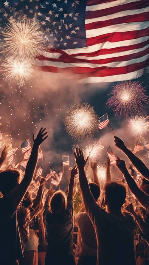 Eine Gruppe von Menschen schwenkt amerikanische Flaggen und blickt hingerissen in einen Himmel voll strahlendem, funkelndem Feuerwerk.