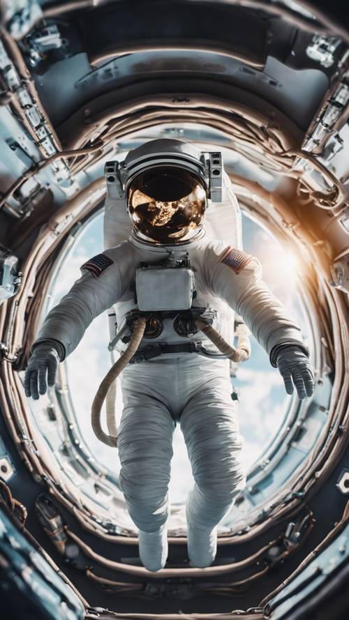 אסטרונאוט צף בחופשיות באפס כוח המשיכה של החלל.