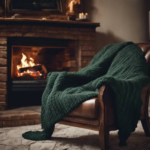  A dark green plaid knitted cardigan draped over a chair near a fireplace.